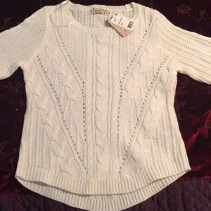 I am selling this ivory, sparkly sweater